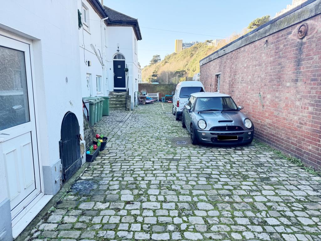 Lot: 81 - FREEHOLD BLOCK OF FOUR TWO-BEDROOM FLATS - Parking area